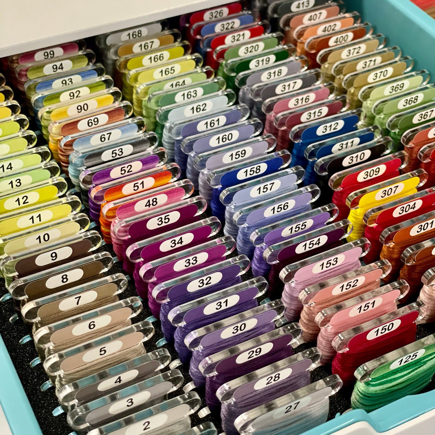 DMC CLEAR premium acrylic bobbins with printed number and colour swatch for cross stitch and embroidery