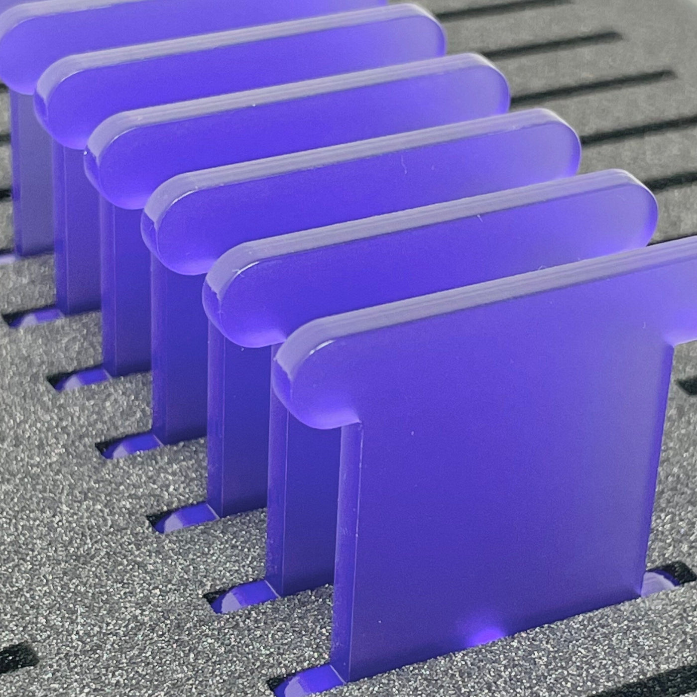 Purple Frost floss storage acrylic bobbins stood in foam insert by Pip and Chip