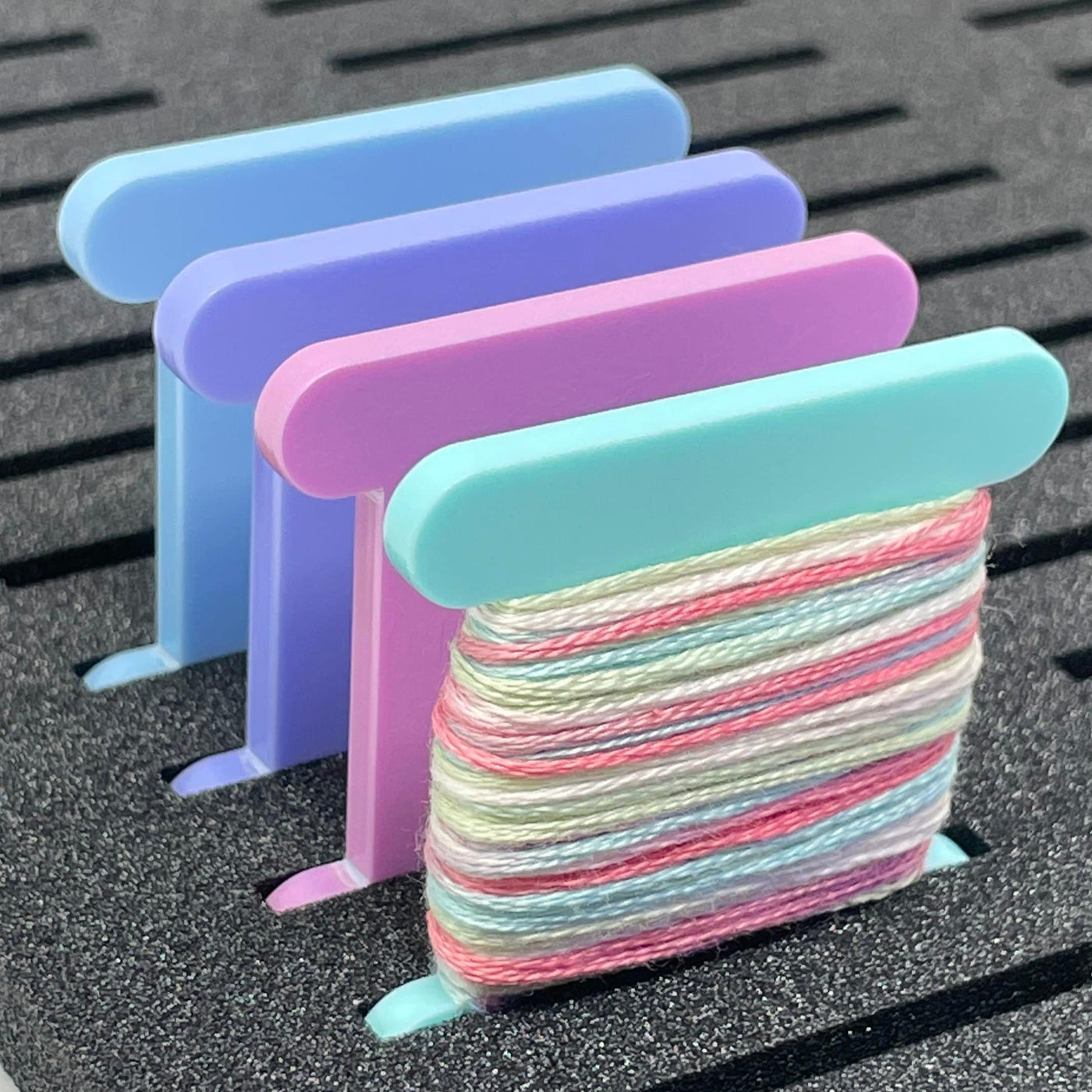 Acrylic floss bobbins in 4 sweet pastel colours by Pip and Chip for cross stitch storage 