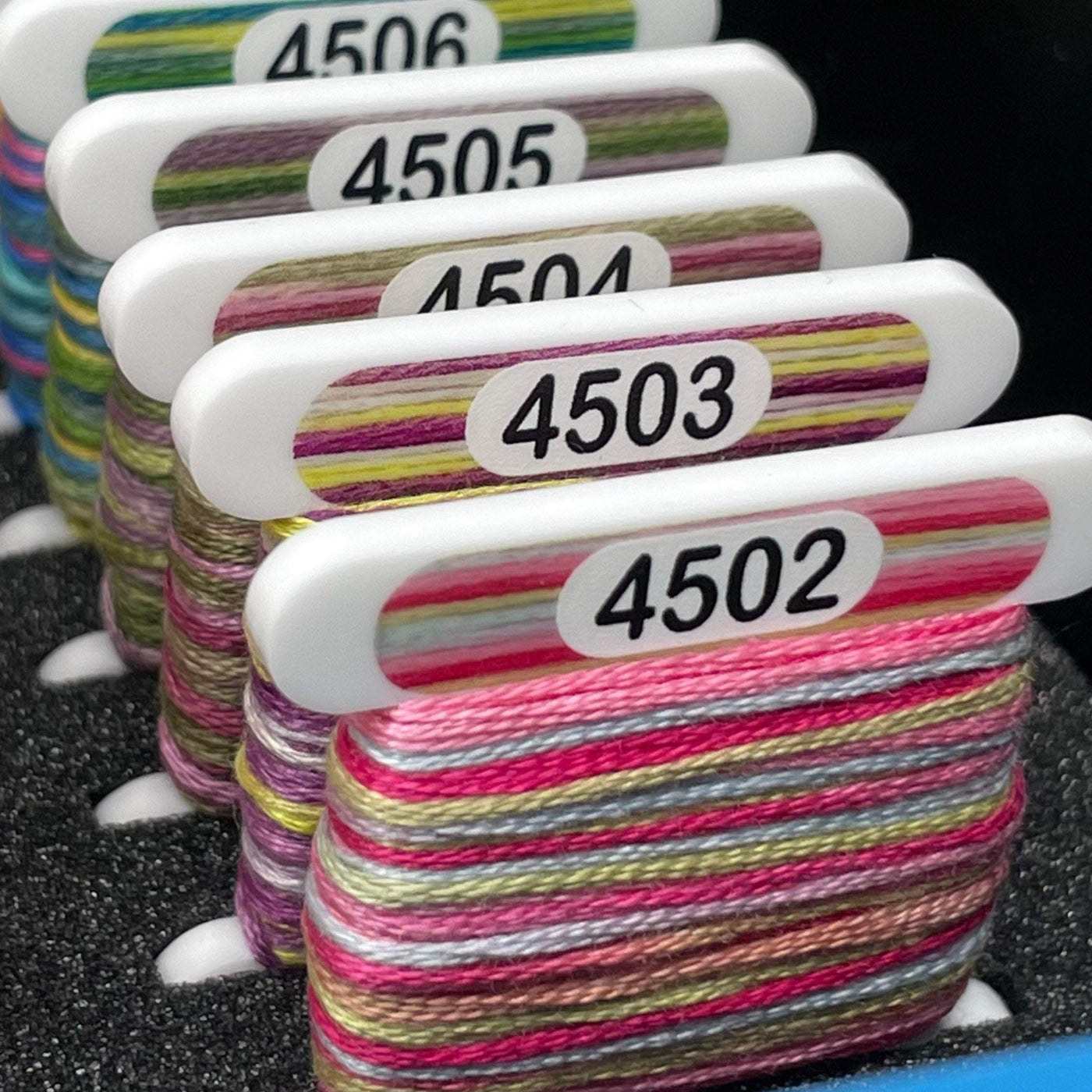 DMC Colour Variations & Coloris 3mm acrylic bobbins with printed number and colours (x84 bobbins)