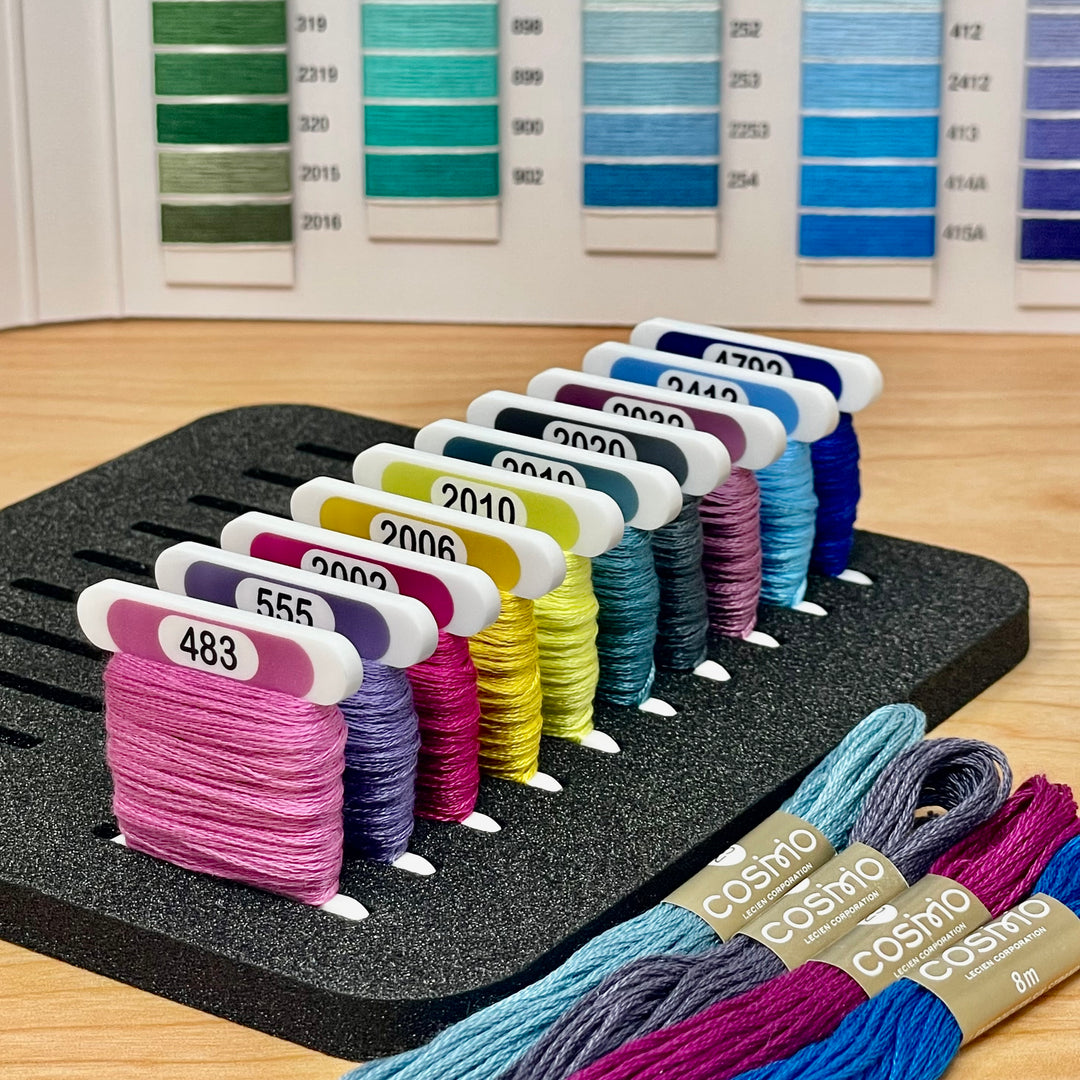 COSMO solid colours (x500) 3mm acrylic bobbins with printed number and colour swatch