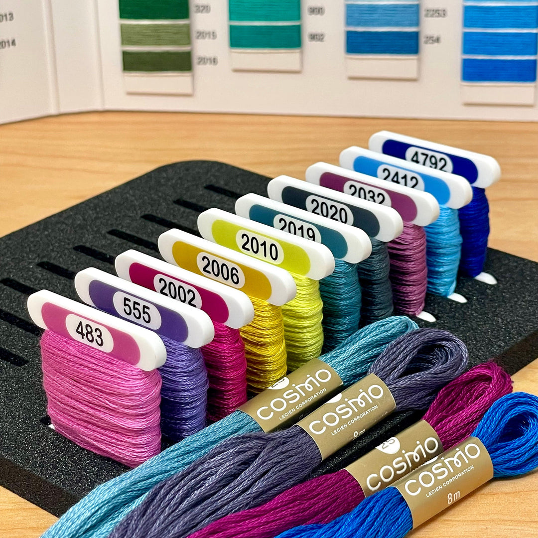 COSMO solid colours (x500) 3mm acrylic bobbins with printed number and colour swatch